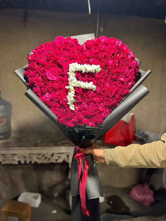 Giant heart-shaped red rose bouquet with personalized white flower initial — Forever in Bloom by Flower House Lahore