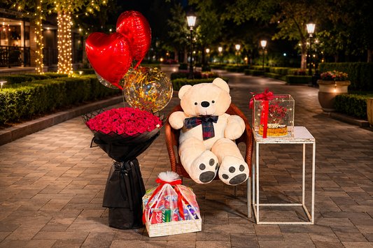 Giant teddy bear with red rose bouquet, heart balloons, gold confetti balloon, personalized cake and snack hamper — gift combo by Flower House Lahore