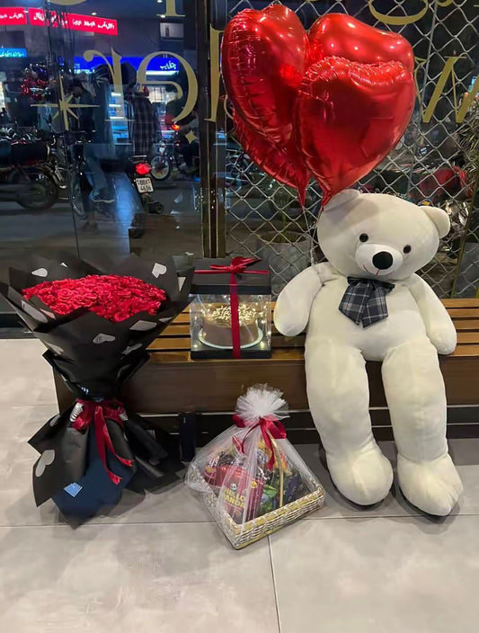 Red rose bouquet with layers birthday cake, white teddy bear and red heart balloons – birthday combo by Flower House Lahore