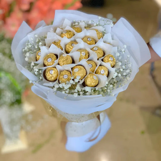 White flowers and chocolate bouquet