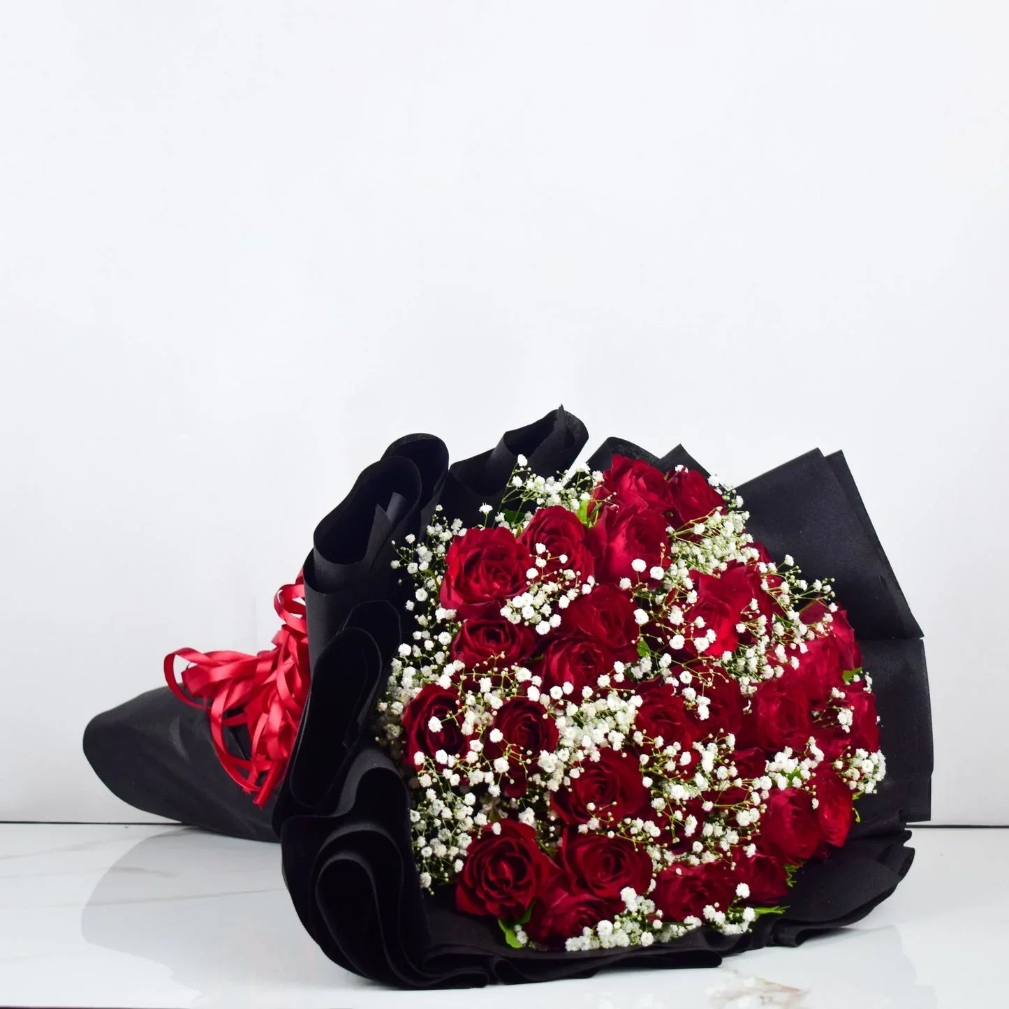 Buy King of Happiness | Red Roses Flower Bouquet | Flower Shops in Lahore