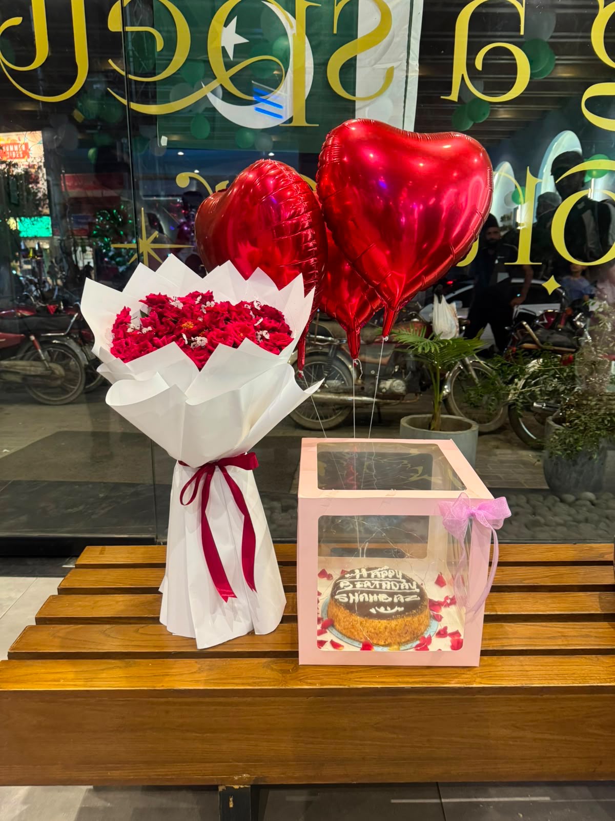 Red rose bouquet with heart balloons and personalized birthday cake in a pink gift box — Flower House Lahore