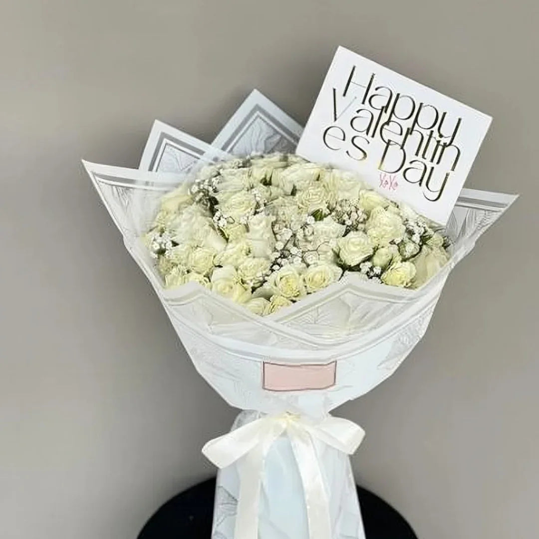 White Eternity grand white rose bouquet by Flower House