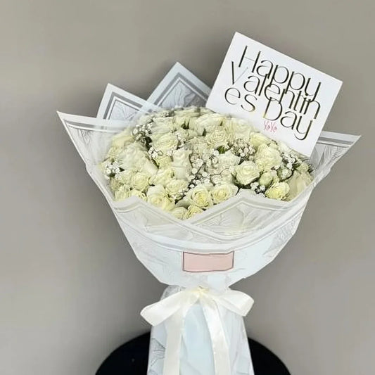 White Eternity grand white rose bouquet by Flower House